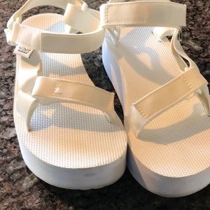 Teva white platform sandals size 7. In great condition.